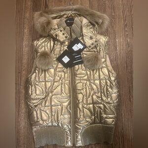 Moose Knuckles x Telfar Gold Quilted
Bomber Vest with Fur Accents